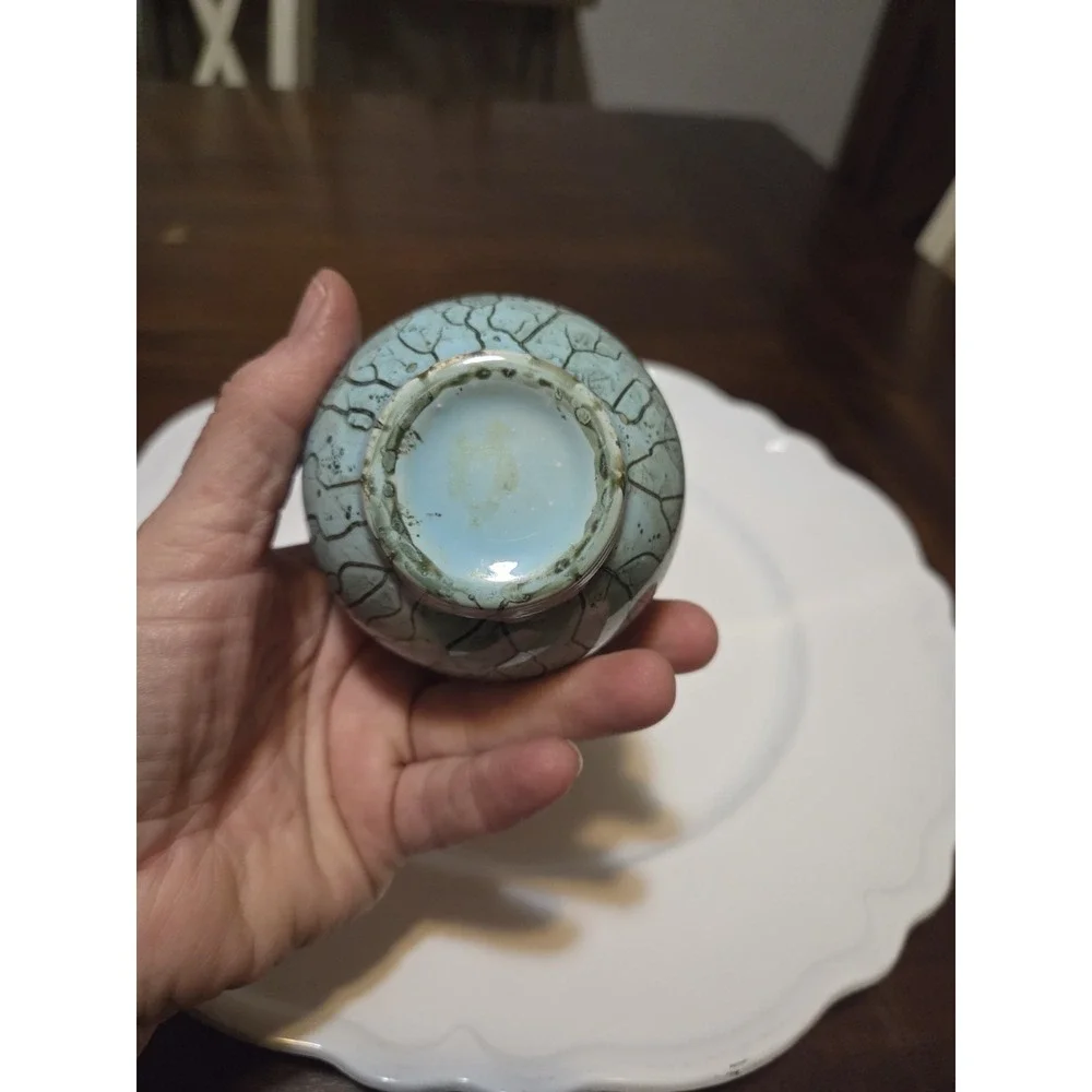 vintage Delft Holland bud vase featuring a brass top